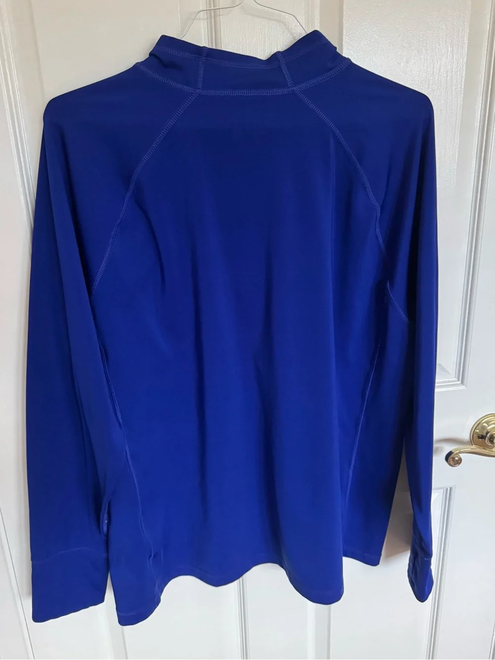 The North Face men's XL long sleeved thick dri-fit top in royal blue. EUC.